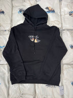 Black pullover hoodie with adjustable drawstring hood and small chest graphic logo