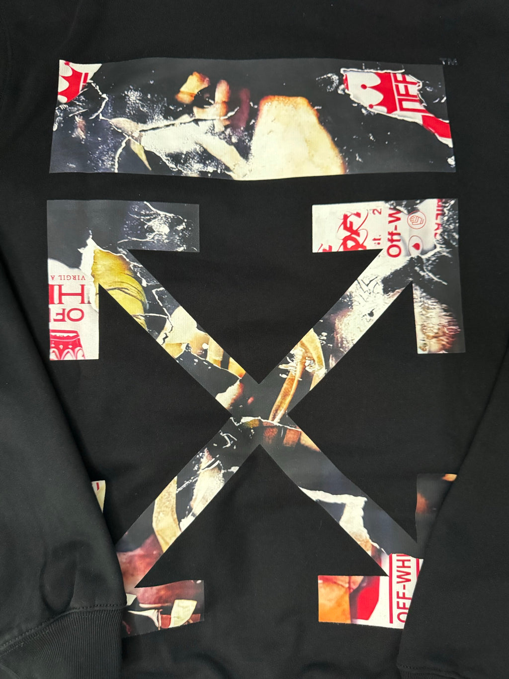 Black hoodie back close-up showing large X-shaped graphic with Off-White branding