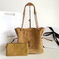 Tan suede tote bag with chain handles, front YSL logo, and matching pouch