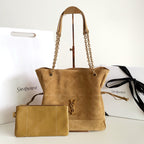 Tan suede tote bag with chain handles, front YSL logo, and matching pouch