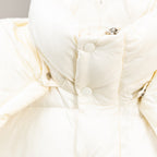 Moncler white puffer jacket close-up of snap placket and quilted panels