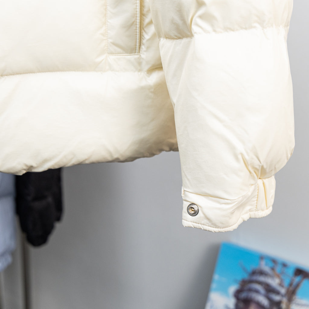 Moncler long padded coat sleeve cuff, off-white, snap button and logo badge