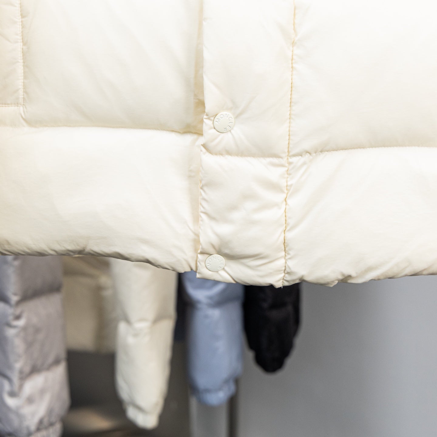 Moncler long padded coat front, off-white, snap-button placket and quilted panels