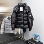 Moncler dark puffer jacket with stand collar and full-zip front