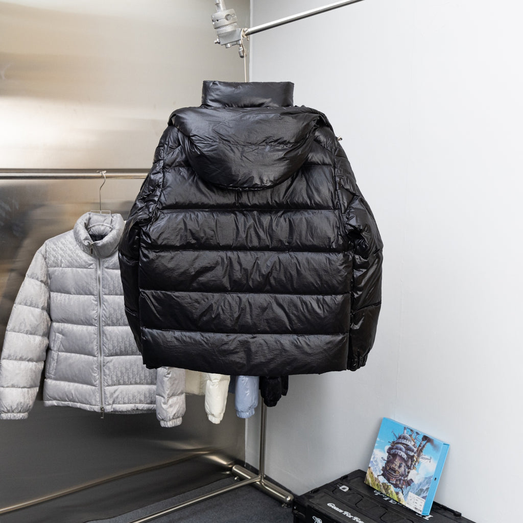Moncler dark puffer jacket, back view with stand collar and quilted panels