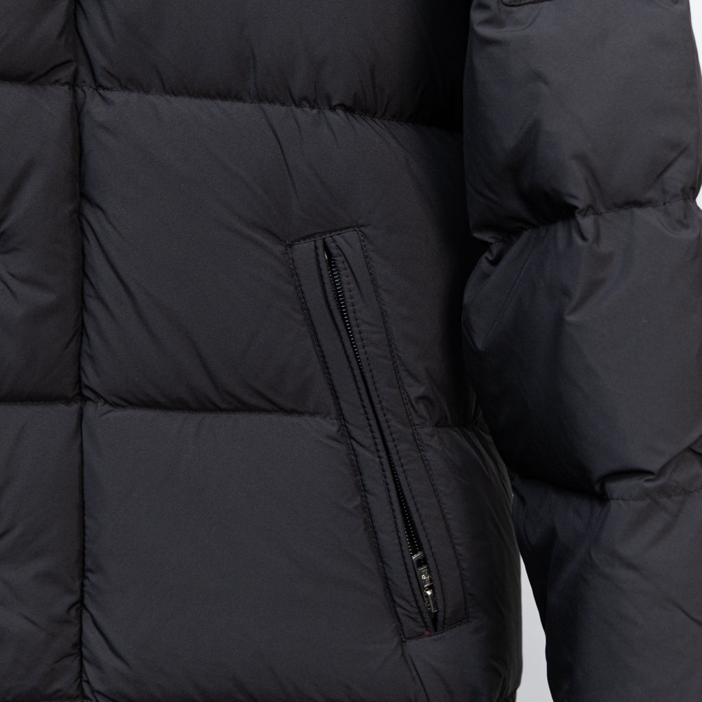Moncler black puffer coat with side zip pocket and quilted panel