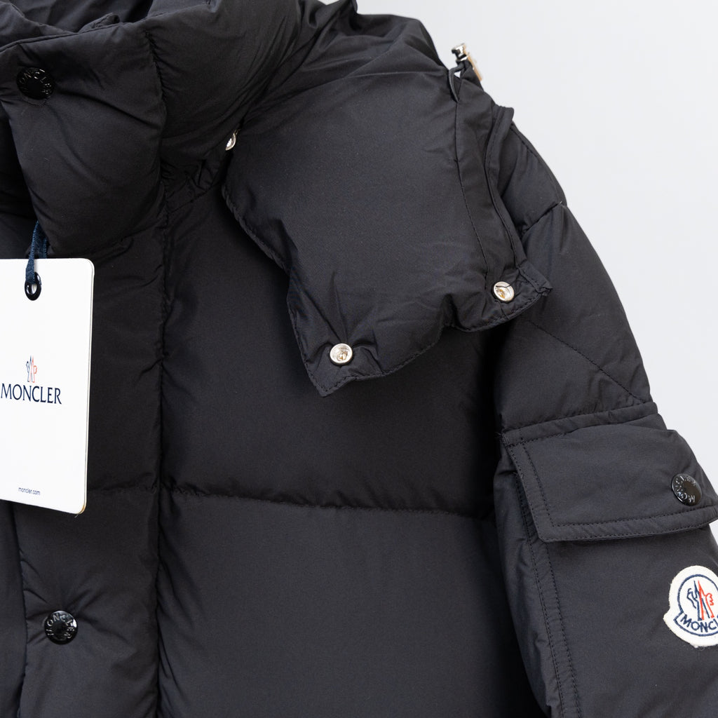 Moncler black puffer coat shoulder with press-stud tabs and logo patch