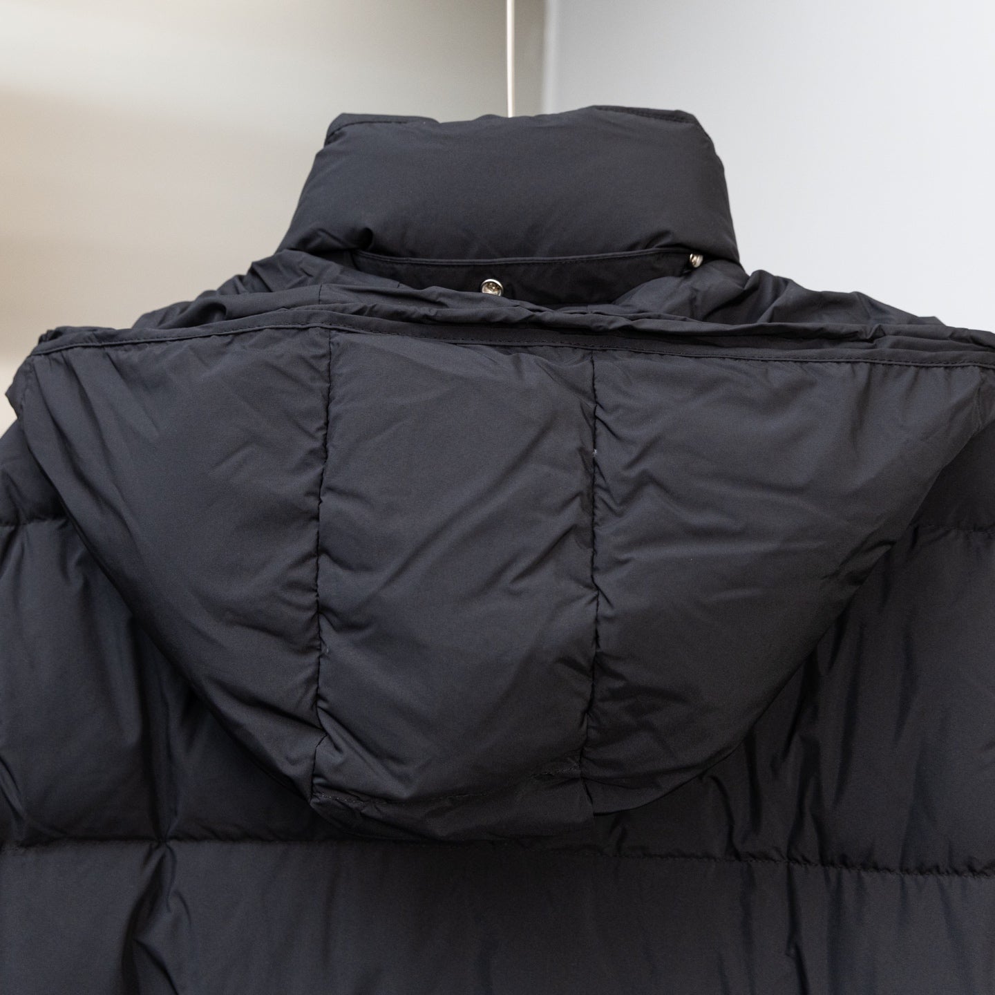 Moncler black puffer coat back upper with hood and seam quilting
