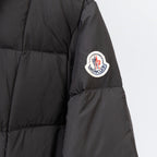 Moncler long puffer coat sleeve logo patch on black quilted fabric