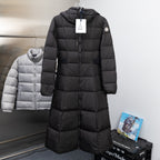Long puffer coat in dark black with full-zip front and Moncler logo patch
