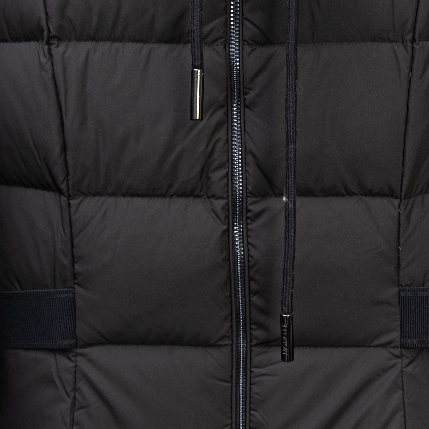 Black puffer coat front zipper with metal pull tab