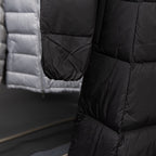 Moncler long puffer coat with cinched hem and quilted diamond stitching