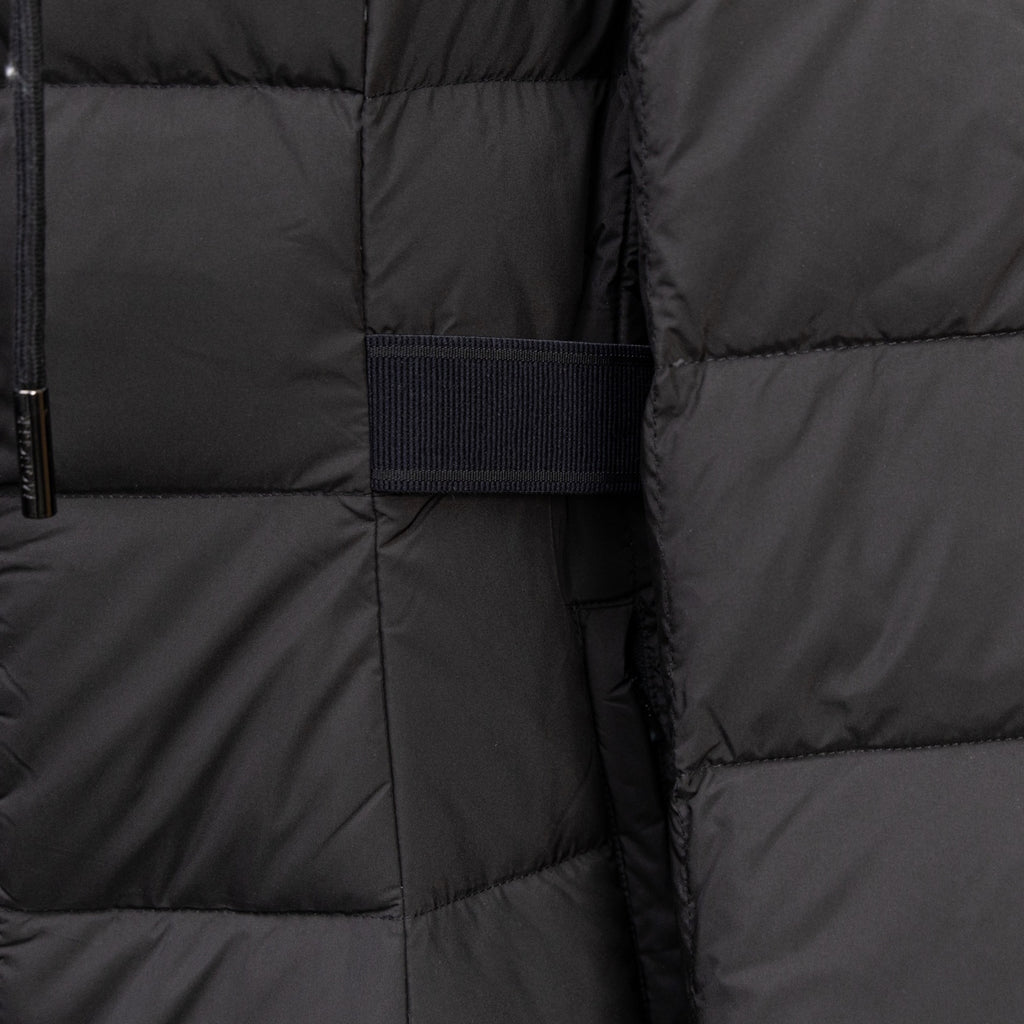 Black puffer coat side panel with dark elastic belt detail