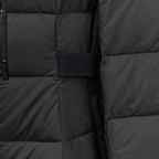 Black puffer coat side panel with dark elastic belt detail