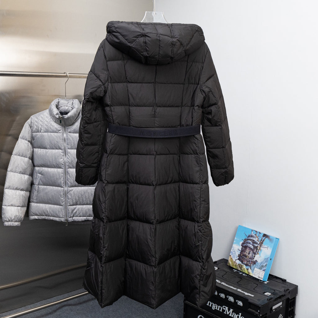 Long hooded puffer coat in dark black with quilted pattern and full-zip front
