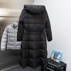 Long hooded puffer coat in dark black with quilted pattern and full-zip front