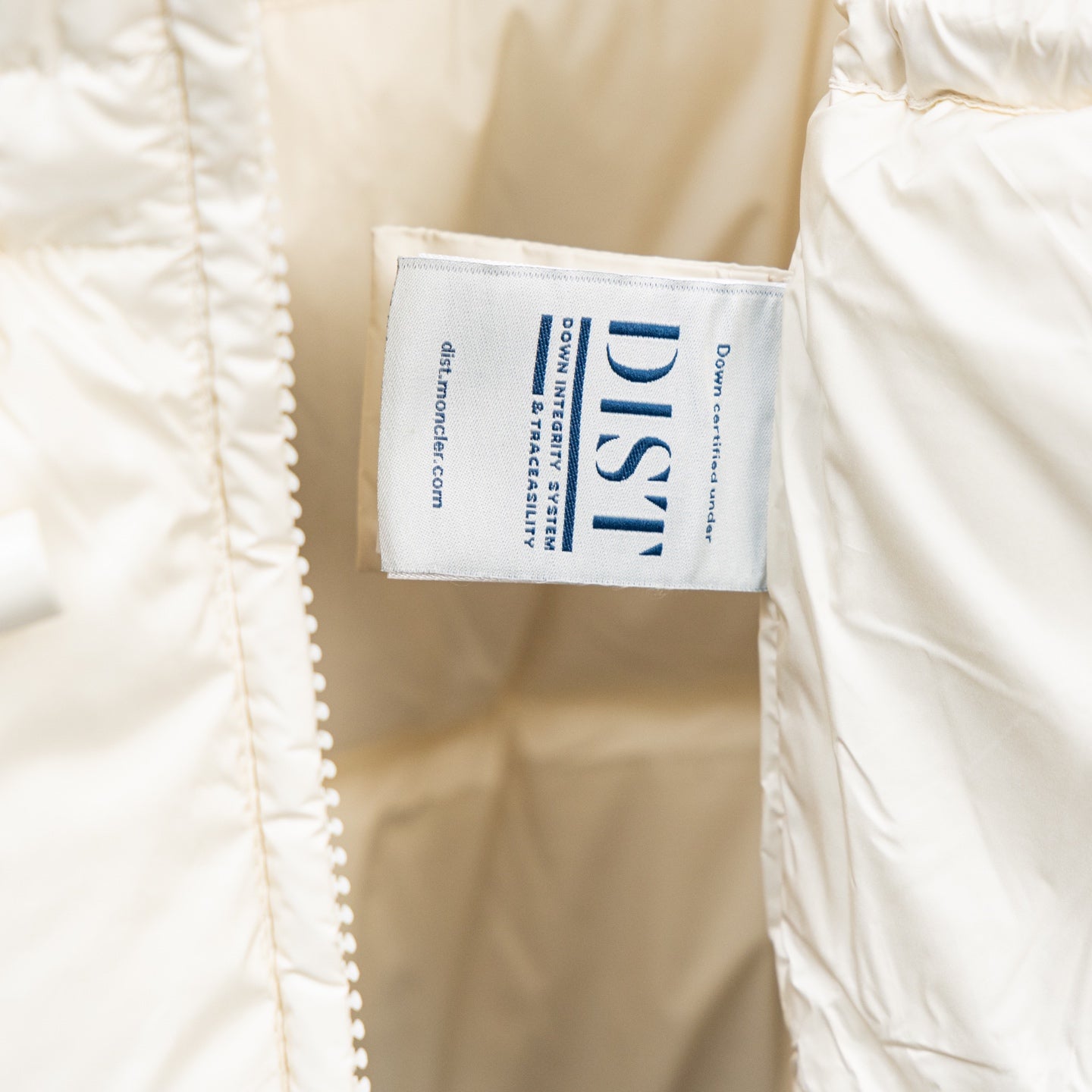 Long puffer jacket interior brand label on lining