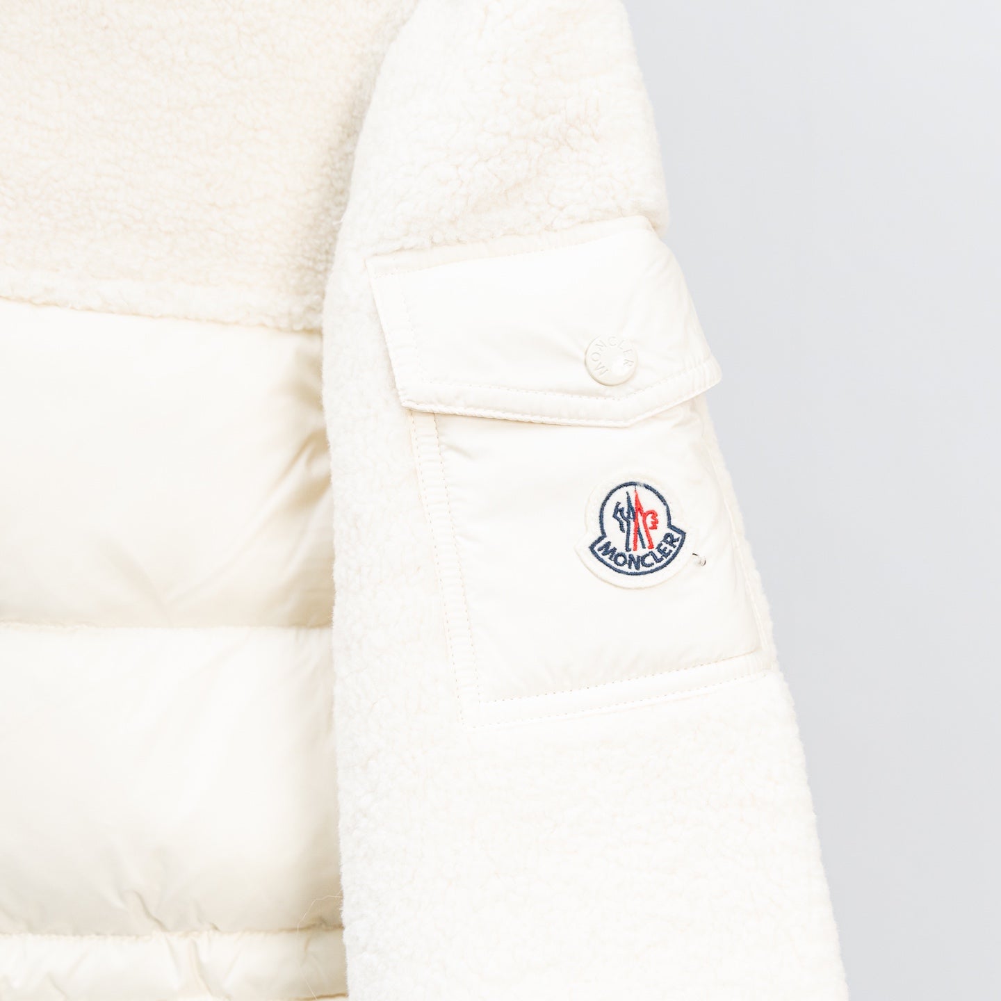 Moncler long puffer jacket, white, round Moncler logo patch on sleeve pocket