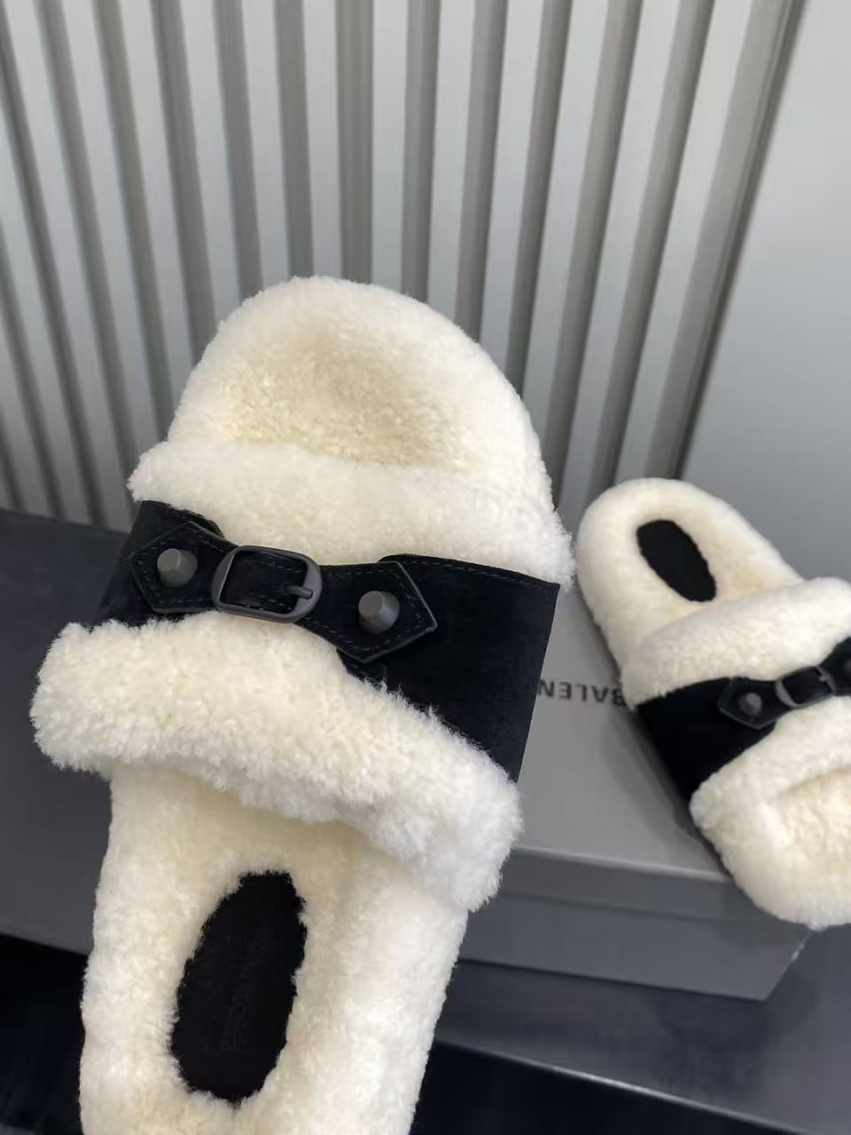Balenciaga plush slide sandals with cream fuzzy footbed and black cross-strap