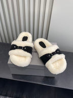 Balenciaga plush slide sandals with black strap and cream teddy-texture upper