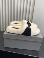Balenciaga plush sandals with black adjustable strap and open toe, cream shearling-look