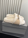 Fuzzy slide sandals, cream sherpa with tan strap and black buckle detail