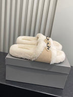 Fuzzy slide sandals, cream sherpa with tan strap and black buckle detail