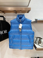 Blue quilted puffer vest with stand collar and front zipper