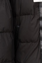 Long black puffer jacket quilted panels and buttoned placket