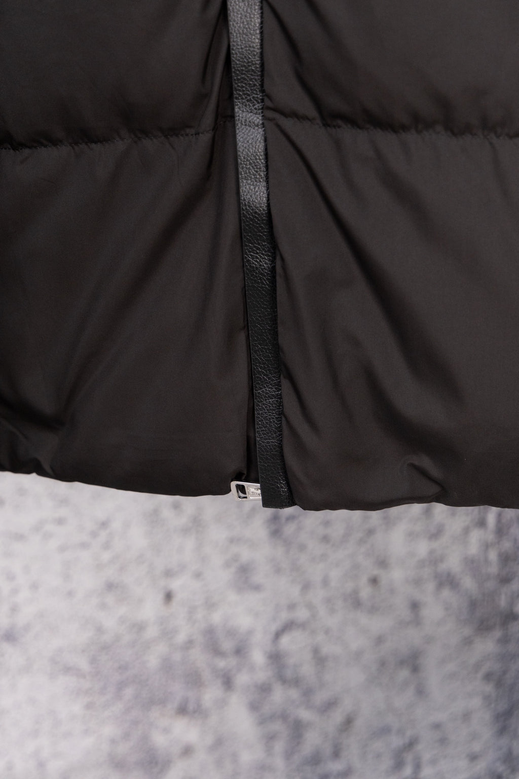 Long black puffer jacket front zipper with textured trim