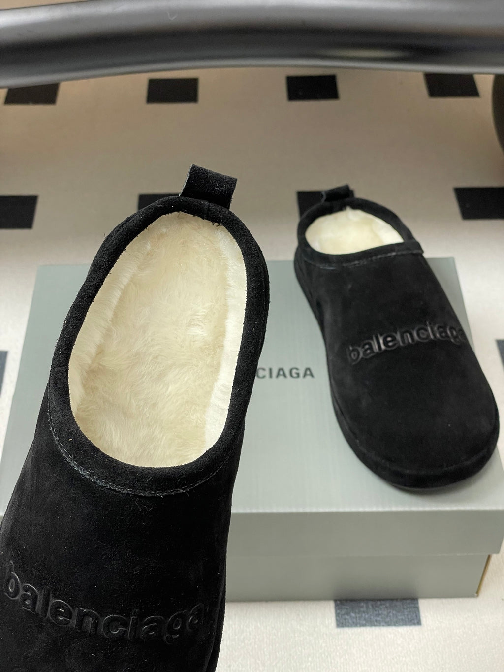 Balenciaga black suede slide sandals, open top showing light interior lining