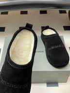 Balenciaga black suede slide sandals, open top showing light interior lining