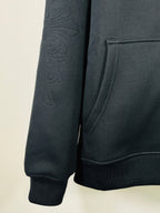 Chrome long dark hoodie sleeve, textured cross embroidery on arm
