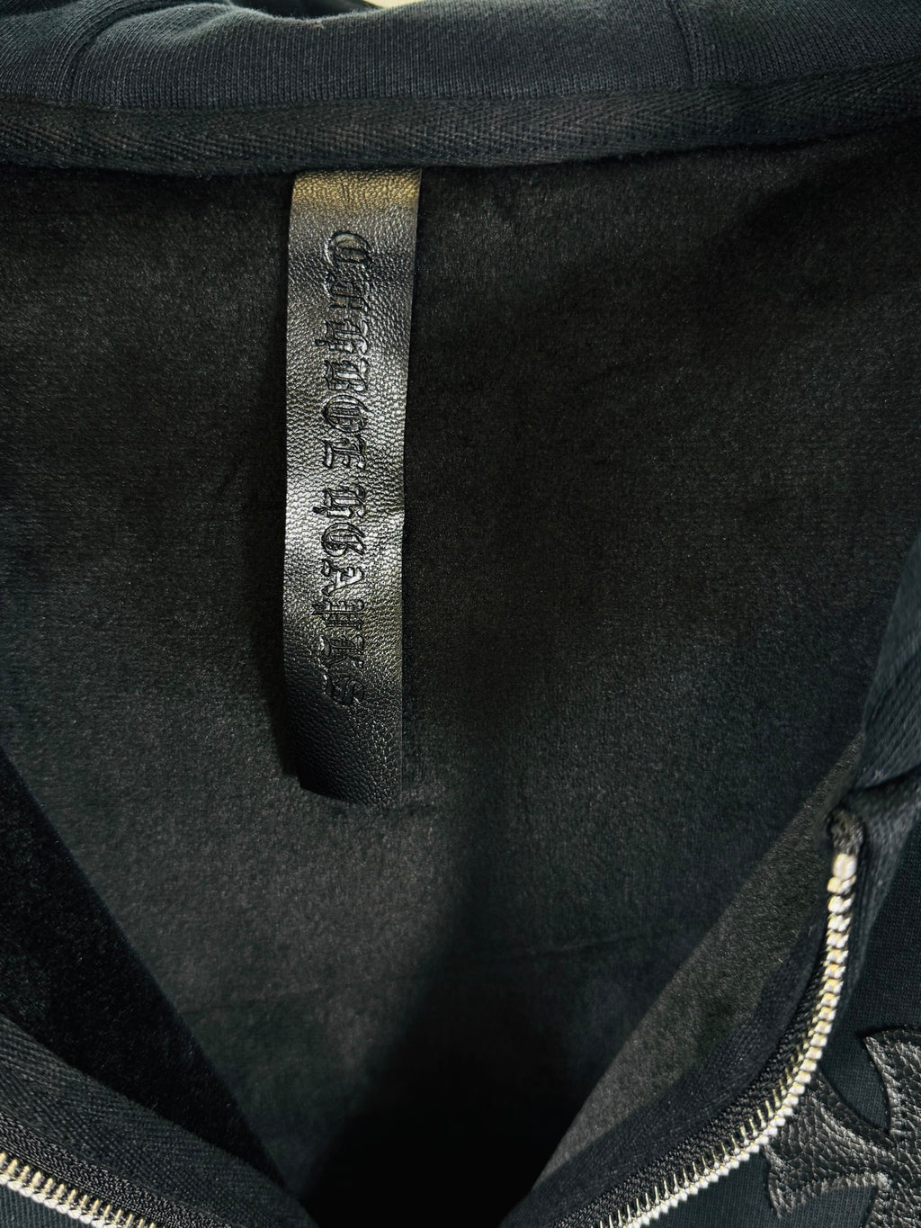 Chrome long dark hoodie, neck label tag inside collar