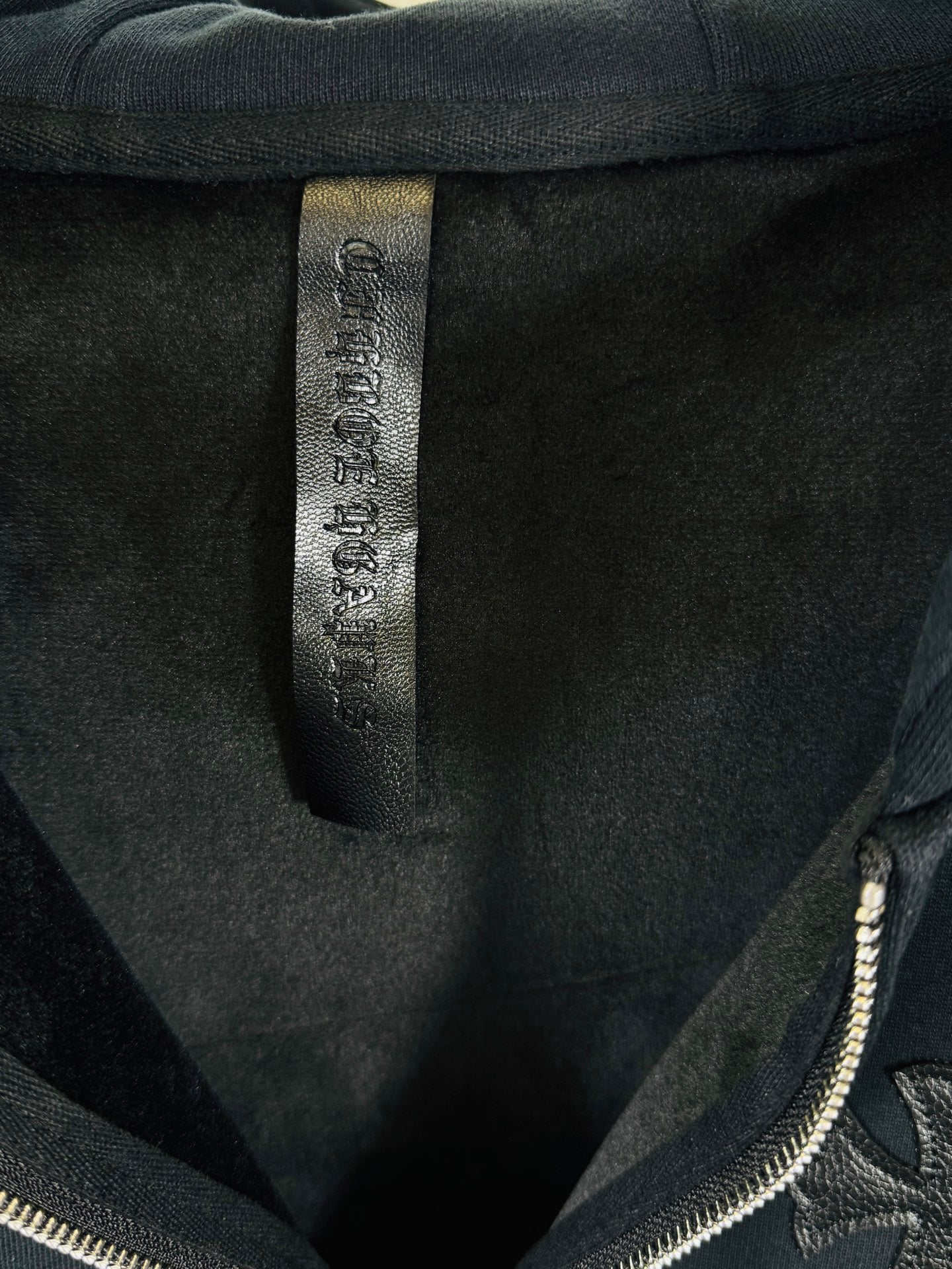 Chrome long dark hoodie, neck label tag inside collar