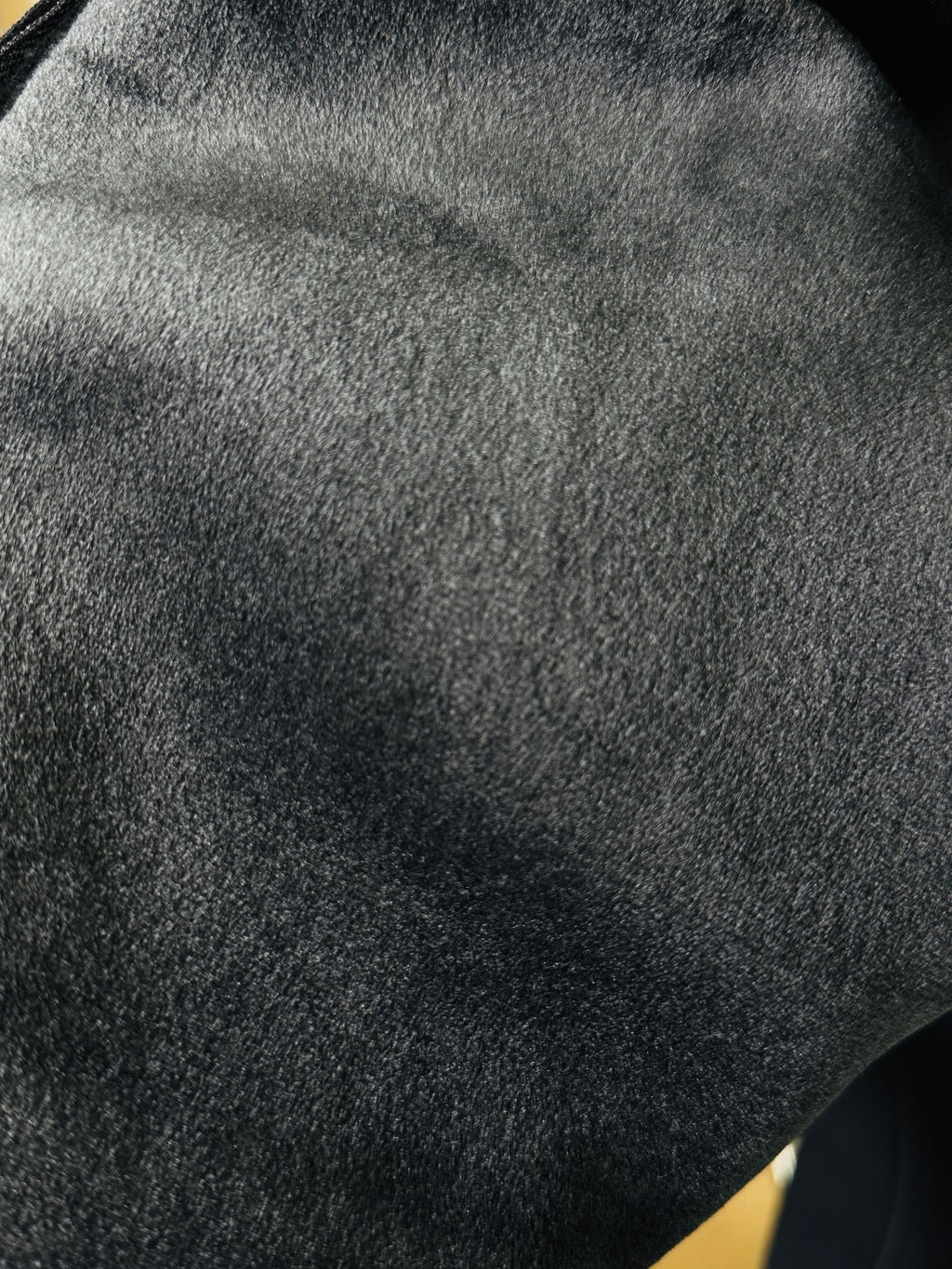 Dark speckled hoodie fabric texture