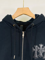 Chrome long dark hoodie close-up: hood, metal zipper, cross patch detail
