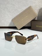 Bvlgari angular sunglasses with dark brown lenses and gold-tone metal frame