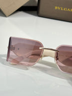Bvlgari square sunglasses with light pink lenses and rose-gold frame
