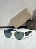 Cat-eye sunglasses by Bvlgari with dark lenses and gold-tone metal bridge