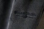 Black pants fabric with BALENCIAGA logo patch detail
