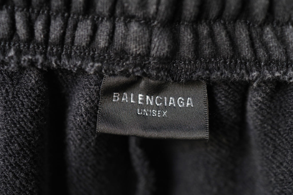 Black inner waistband label reading BALENCIAGA UNISEX