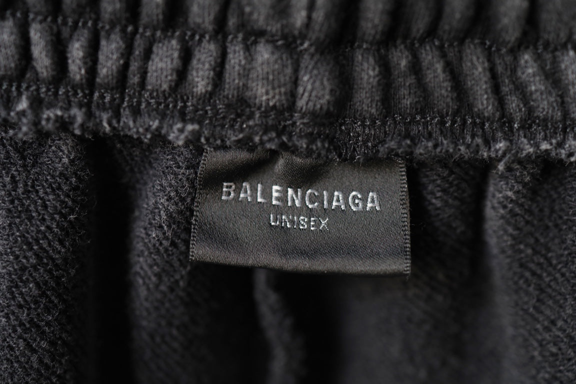 Black inner waistband label reading BALENCIAGA UNISEX