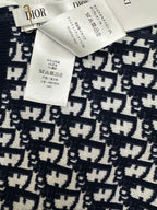 Black-and-white patterned fabric panel from a zip-up hoodie with woven Dior look