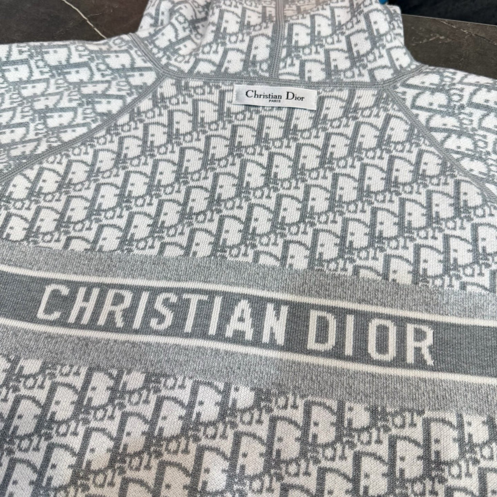 Dior long-sleeve zip hoodie with navy knit and repeating Dior logo pattern