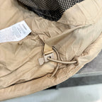 Light beige long coat with adjustable drawstring hood and snap button