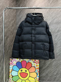 Burberry hooded puffer jacket, dark quilted front with full-length zipper.