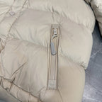 Burberry puffer jacket, light beige with center zip and snap-button placket.