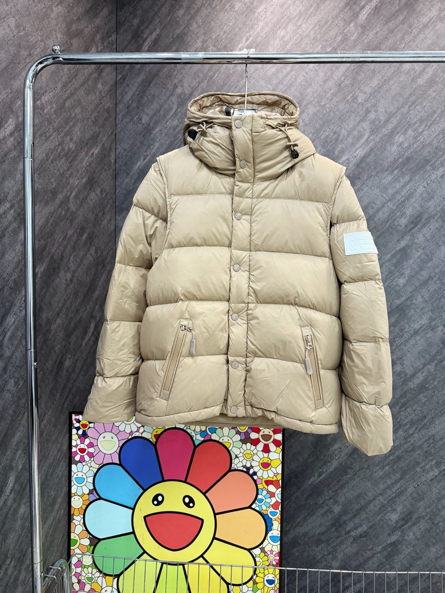 Burberry hooded puffer jacket, light beige quilted front with full zipper.