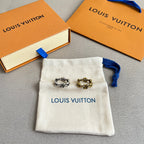 Louis Vuitton jewelry pouch with two chain bracelets, one silver-tone and one gold-tone